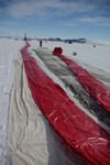The balloon in the red bag is laid out.